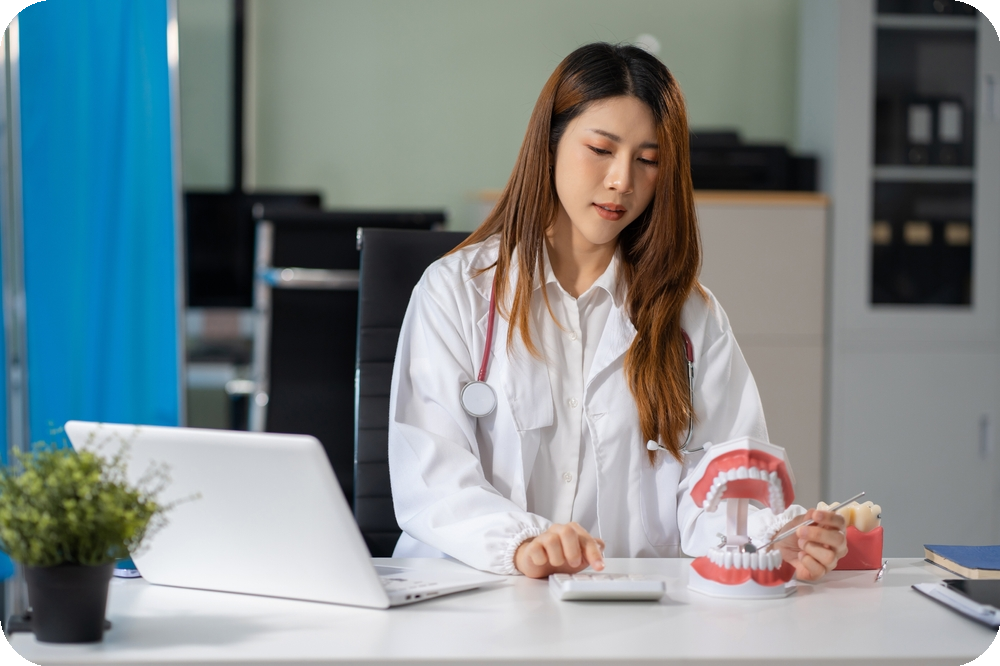dentist doing her accounts